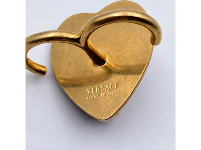 Versace Anillo con forro de Virtus de corazón de metal dorado Talla M Nunca usado Roja 